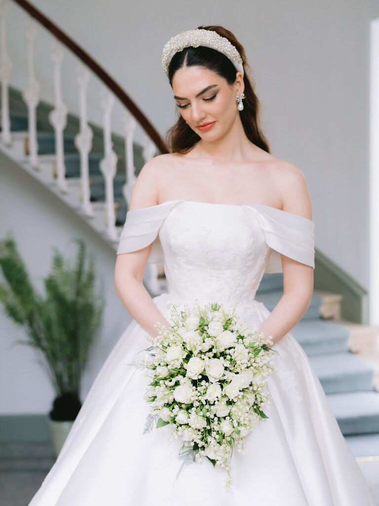 Beautiful bride with white bouquet