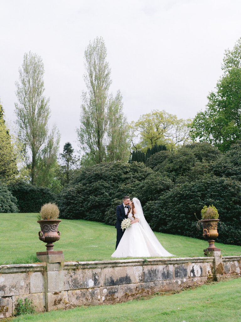 Wedding portrait in gardens of Hawkstone Hall